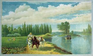 barge on river being pulled by horses